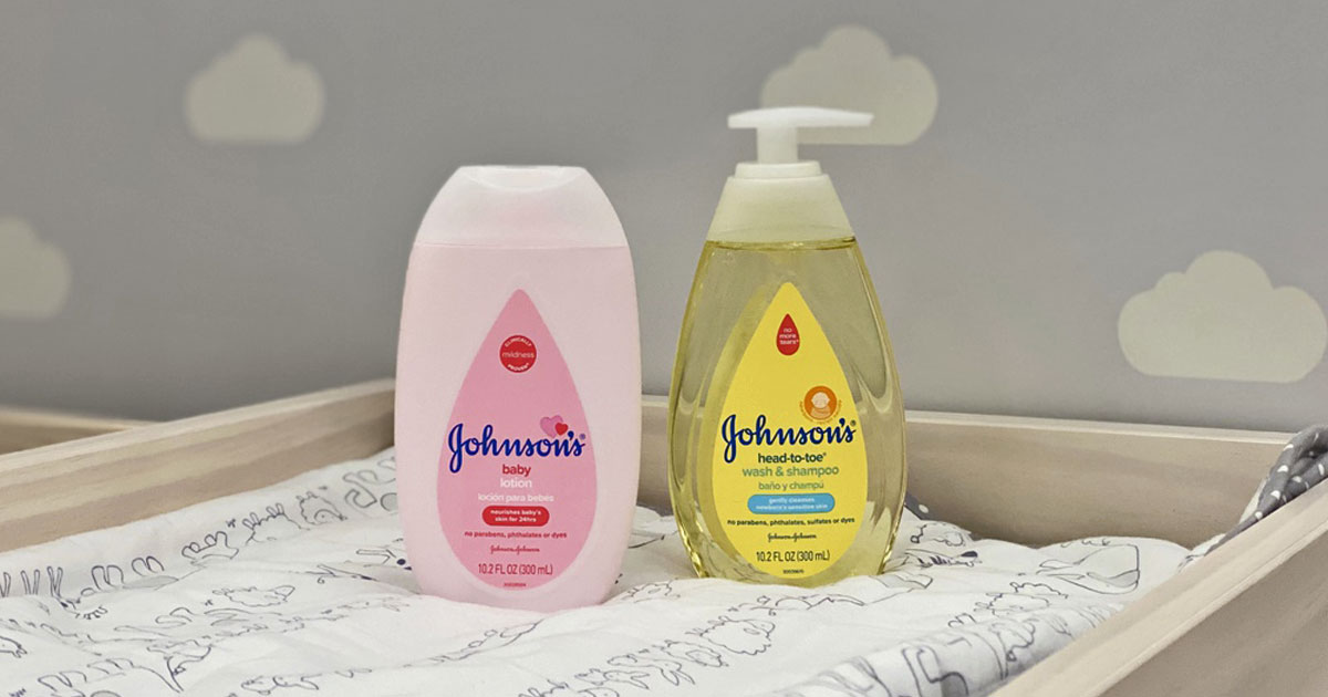 A bottle Johnson's Baby Pink Lotion and Head to Toe Wash on a diaper changer 