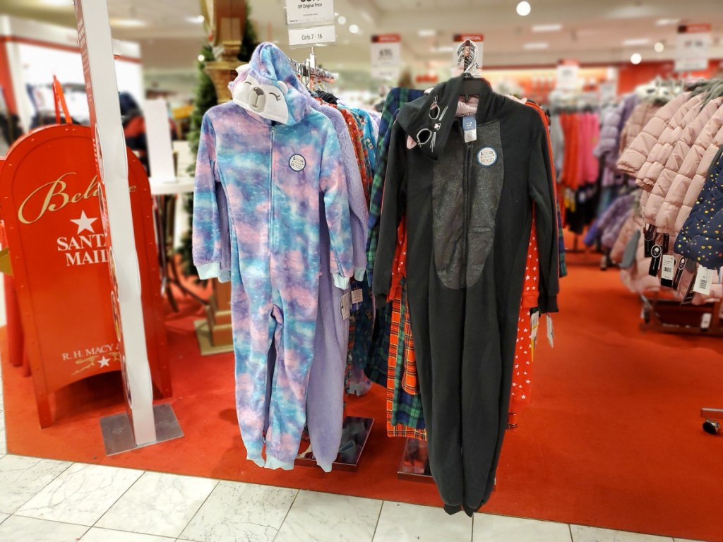 max and olivia pajamas hanging up in store