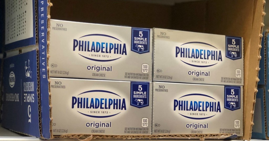 philadelphia cream cheese blocks on a shelf in a store