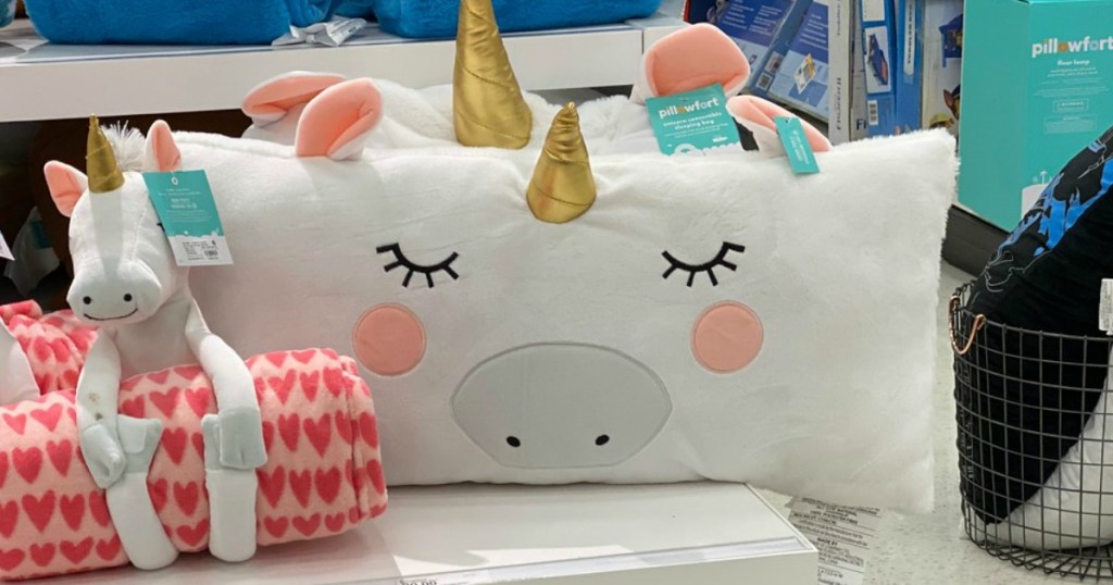 unicorn pillow on display in a store
