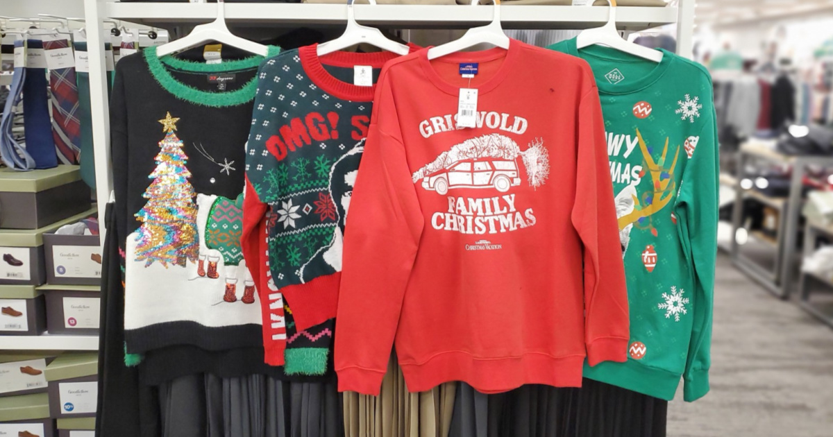 ugly christmas sweaters hanging in store