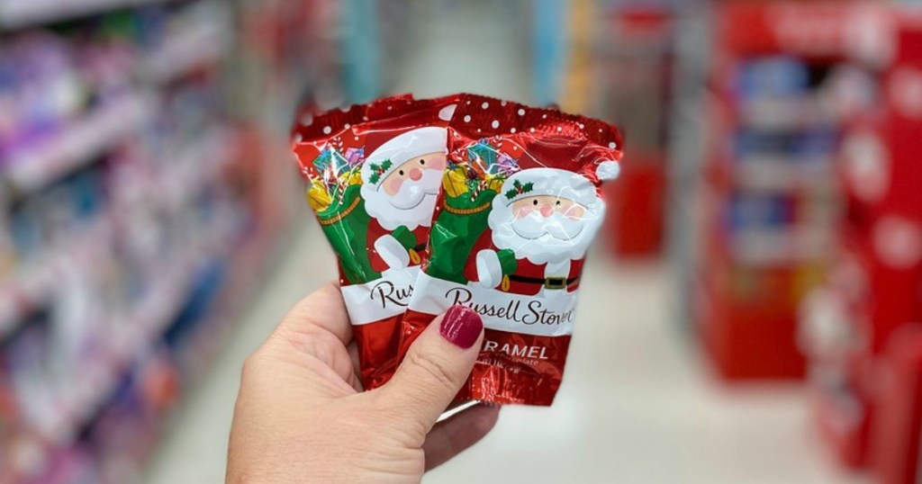 hand holding christmas candy in a store