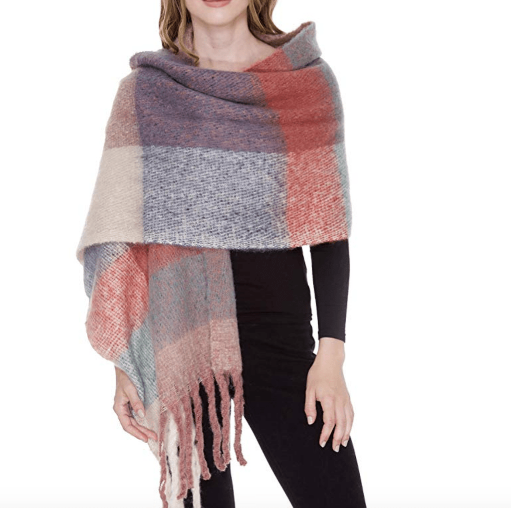 woman wearing plaid blanket scarf