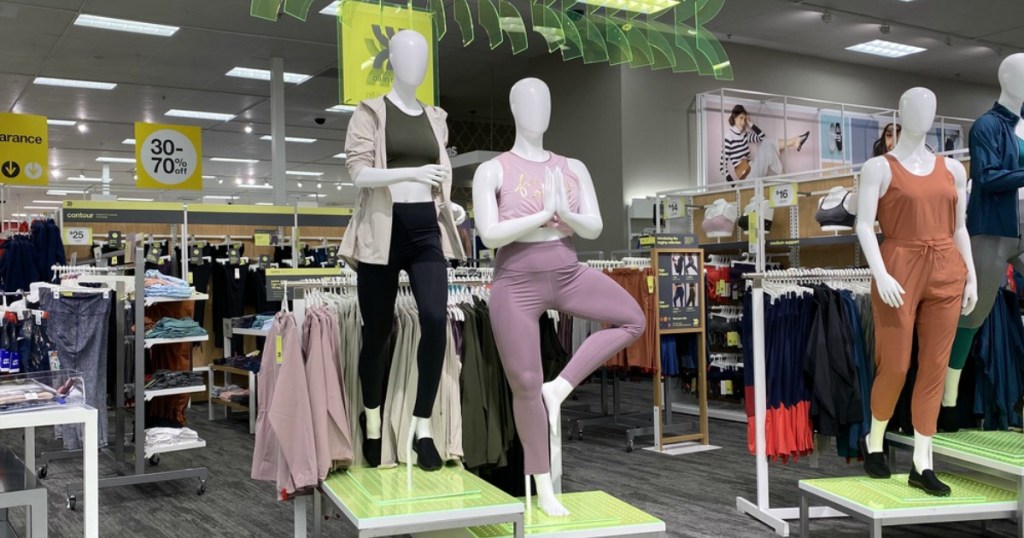 two manequins wearing active wear in-store