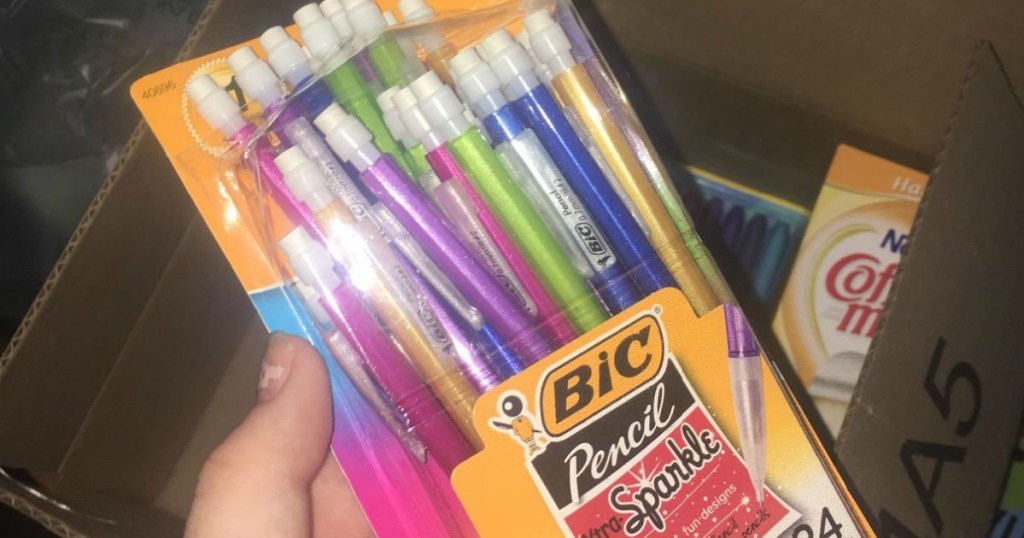 woman holding package fof BIC sparkle mechanical pencils