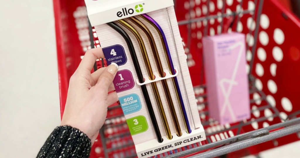 holding ello reusable straws with Target cart in background 