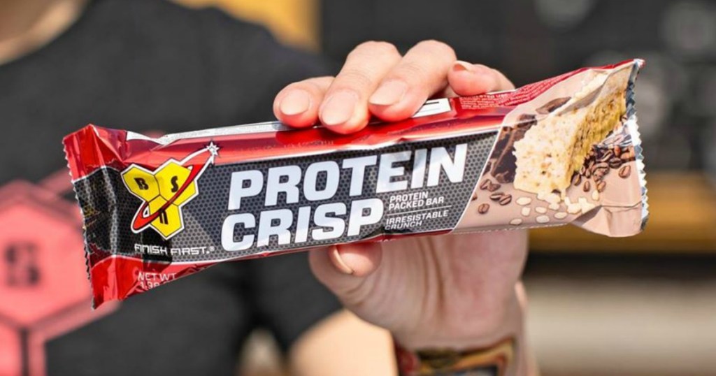 person holding a BSN Protein Crisp Bar
