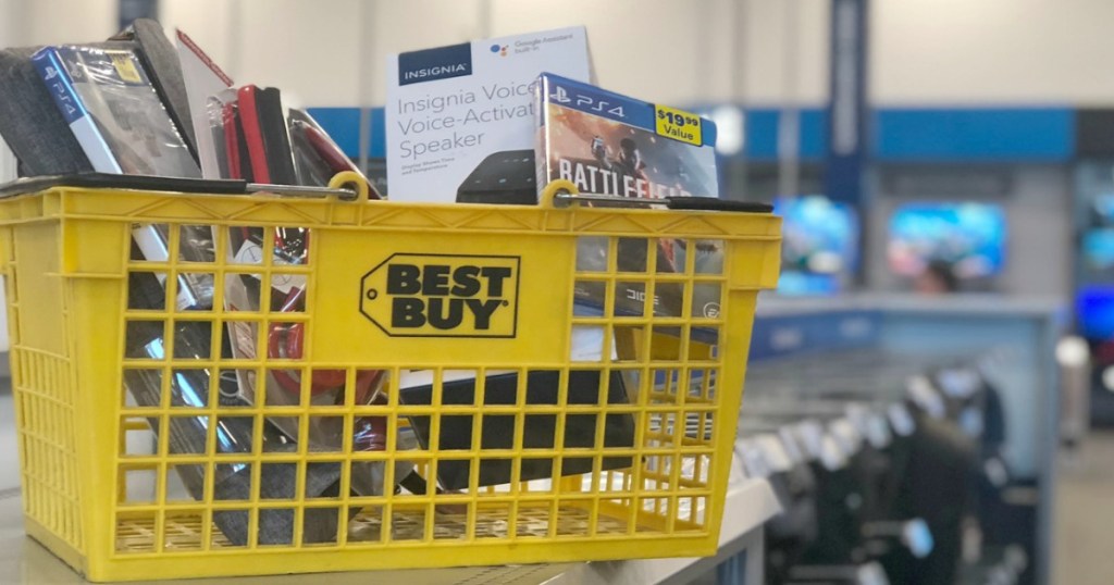 full yellow shopping basket in electronics store