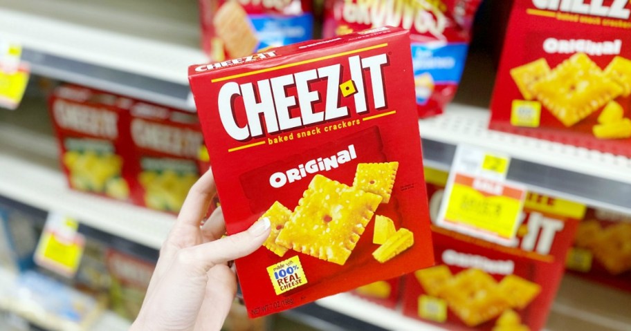 hand holding box of CheezIt Crackers at Dollar General