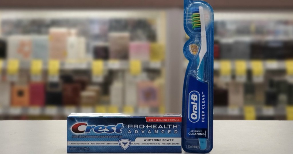 Crest Toothpaste and Oral-B Toothbrush on counter at Walgreens
