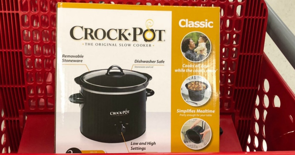A CrockPot brand slow cooker in package in red shopping cart