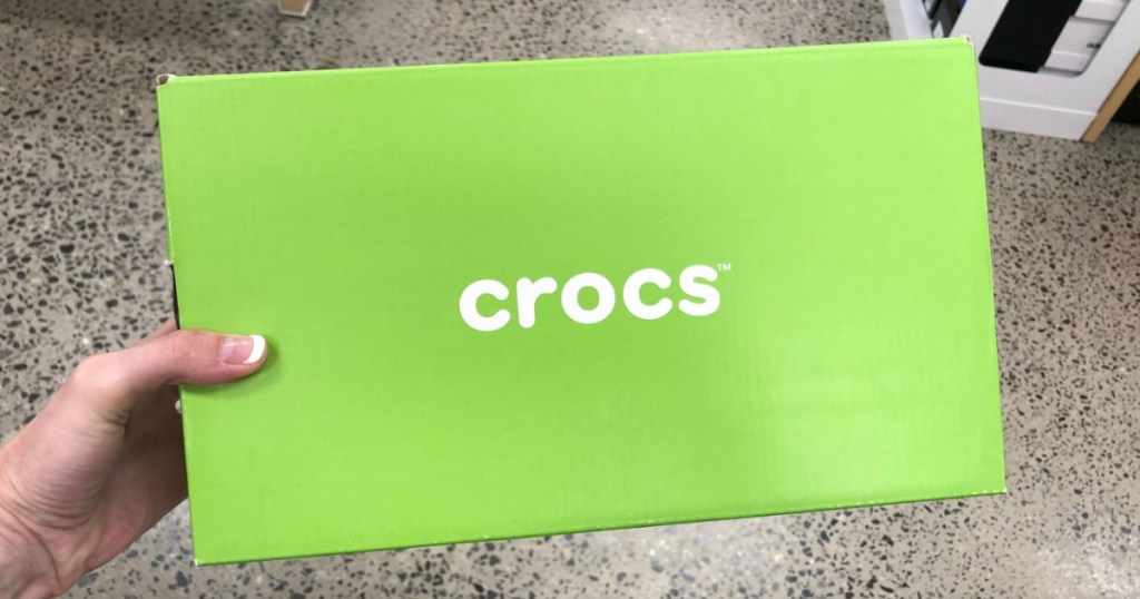 Crocs shoe box in-store in hand