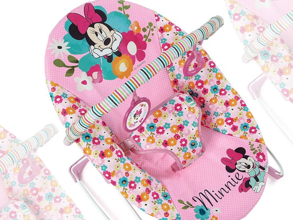 pink Minnie Mouse baby bouncer seat with toys attached to bar