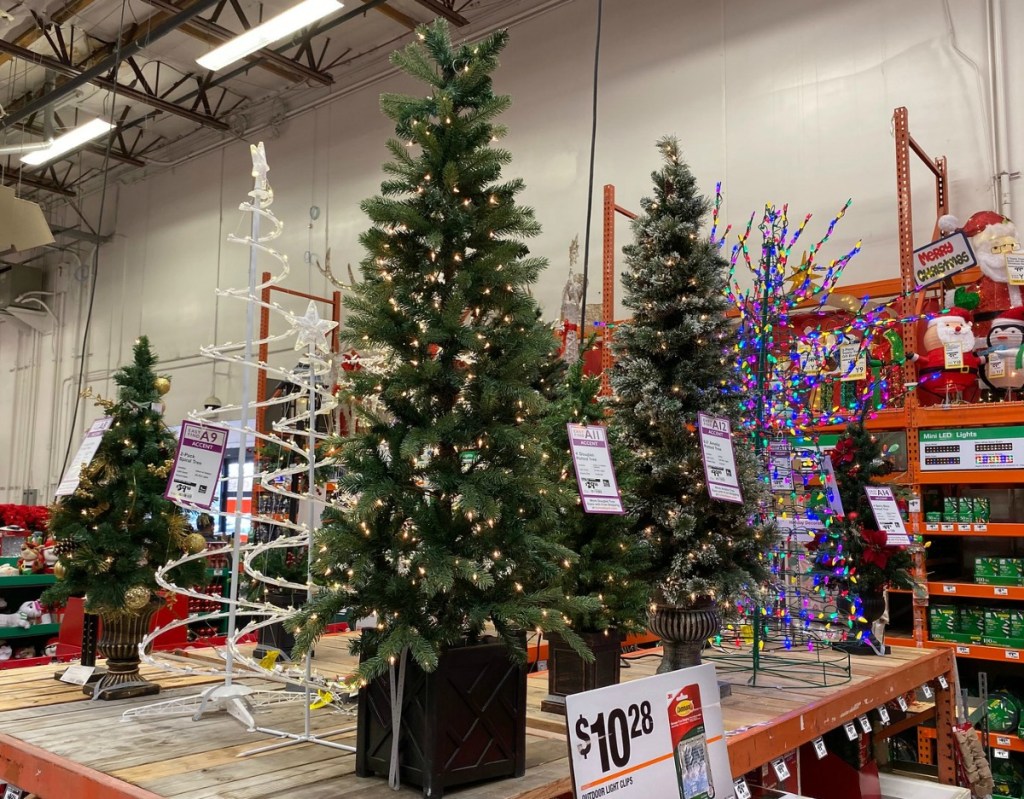  Douglas Potted Artificial Christmas Tree on display in Home Depot store