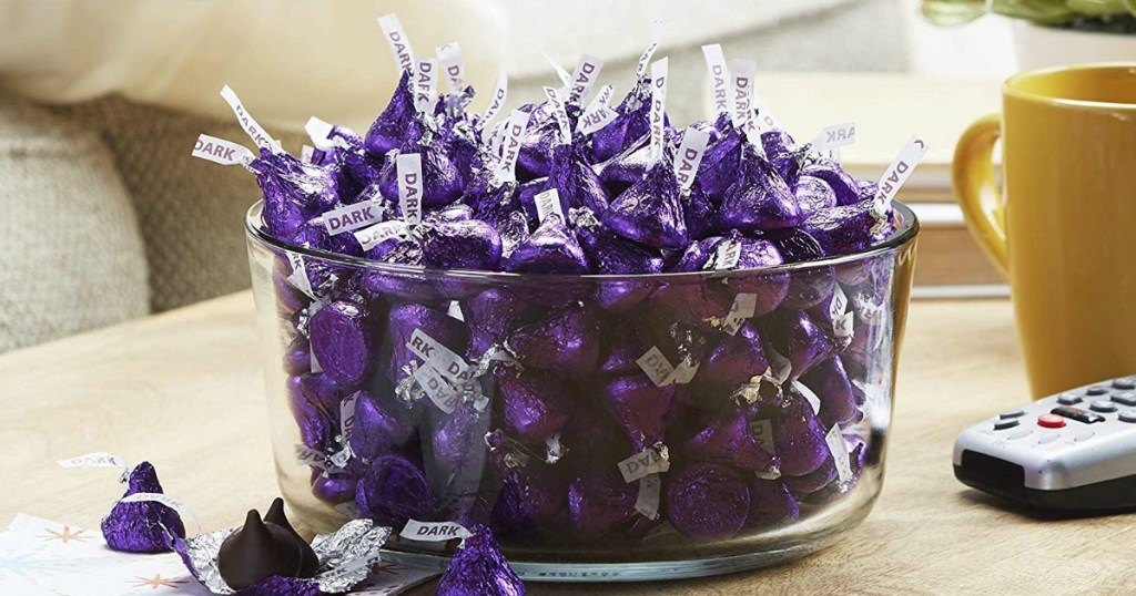 Bowl filled with Hershey's kisses in purple wrappers
