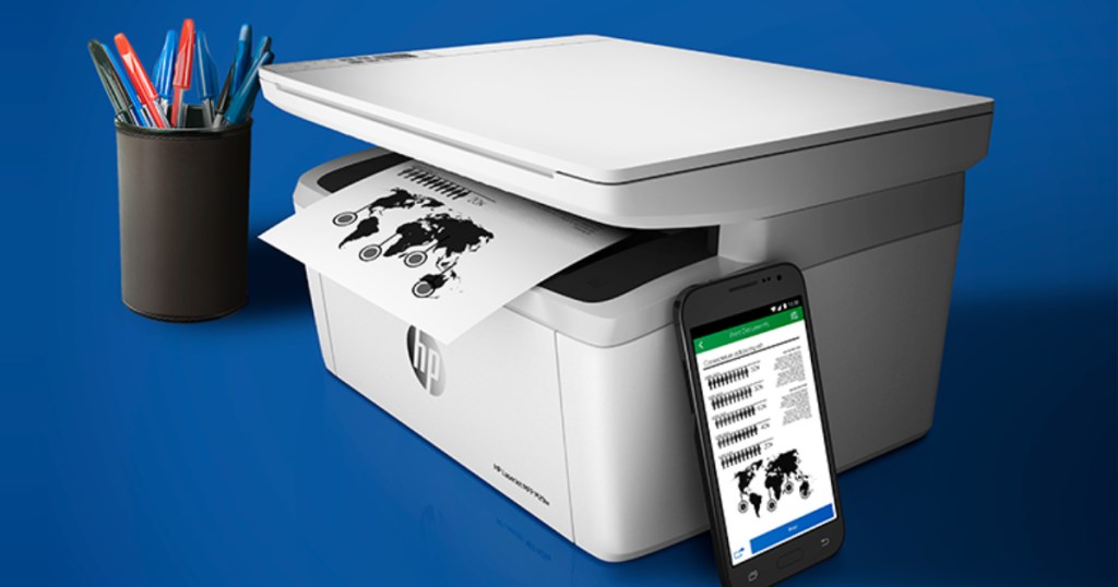 hp laser printer with phone and pens next to printer