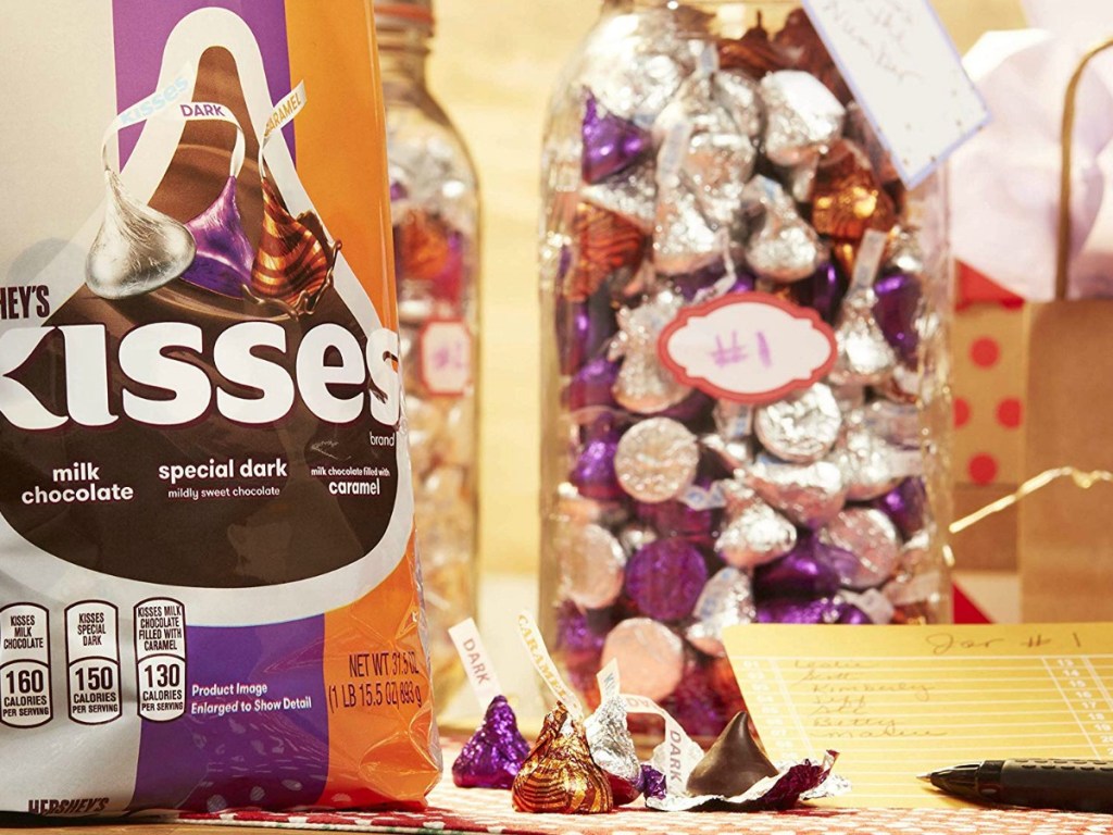 An extra large bag of Hershey's kisses in a jar