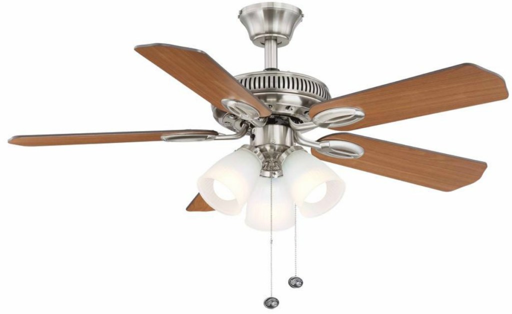 Brushed nickel ceiling fan with wooden panels and three lights