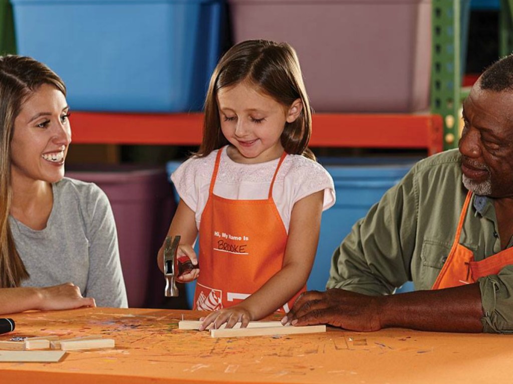 child working on a Home Depot project
