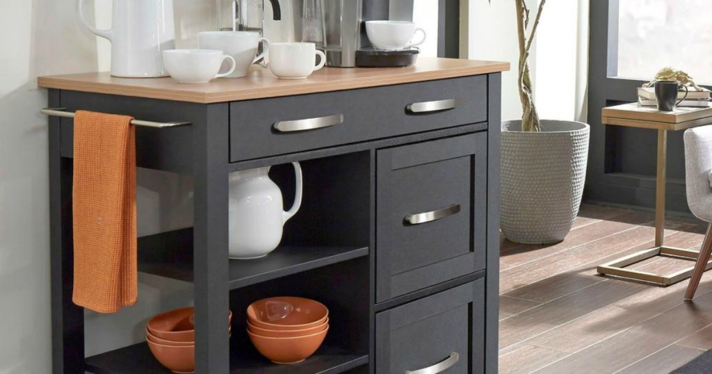Black kitchen cart with coffee mugs and accessories