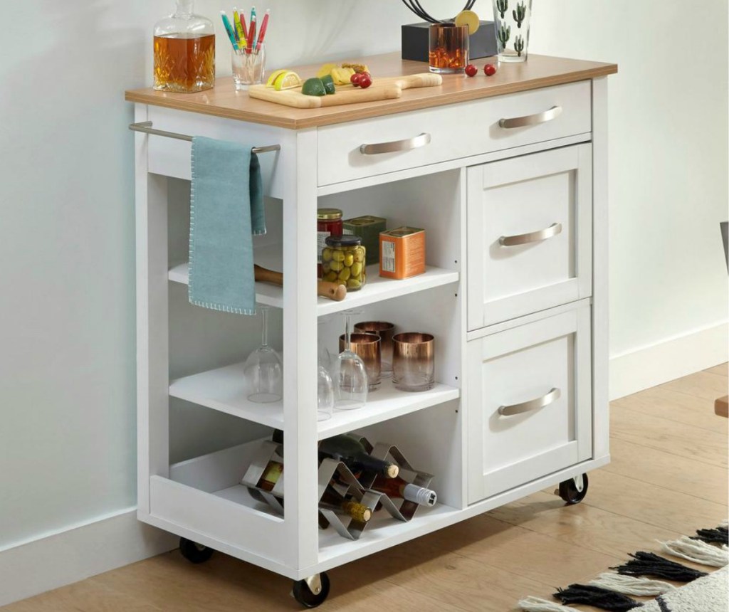 White kitchen storage cart with wooden top and built-in towel rack