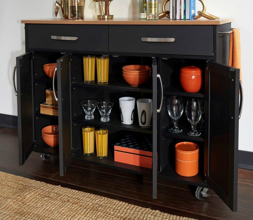 Extra wide kitchen cart with glasseware in the open cupboards