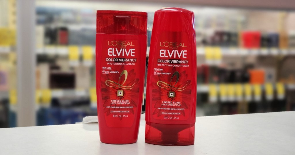 two red bottles of L’Oréal Elvive Shampoos and Conditioners
