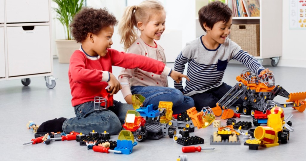 Kids playing in floor with LEGO Tech Machines Set