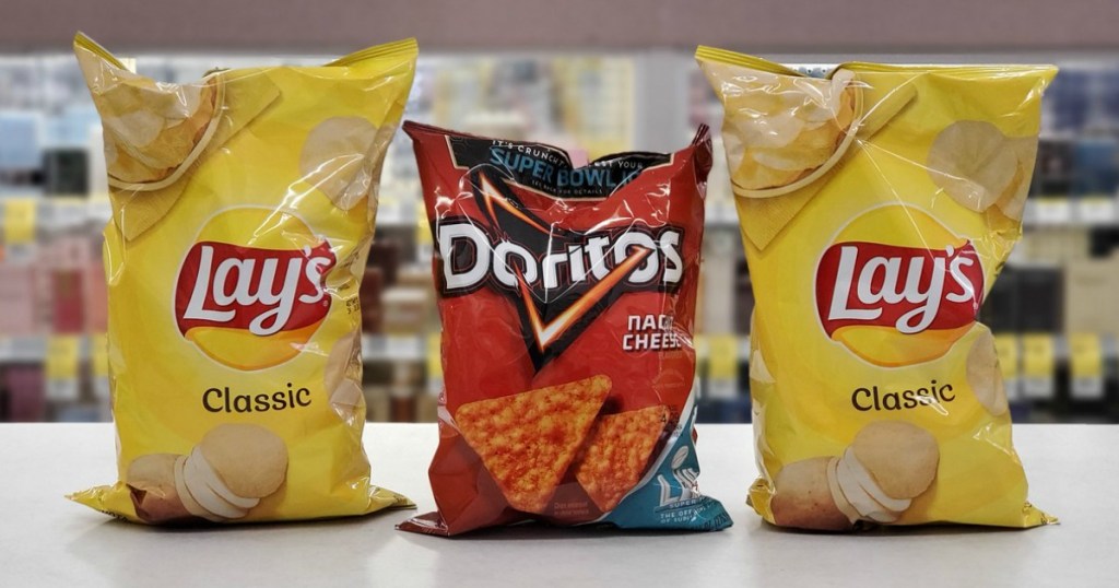 Lays and Doritos on store counter