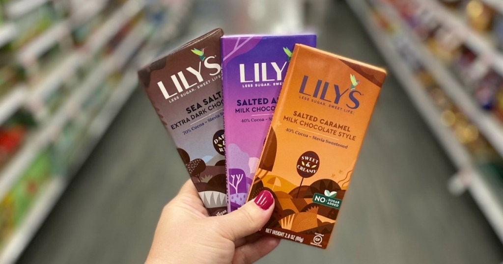 Hand holding Lily's Chocolate Bars at Target