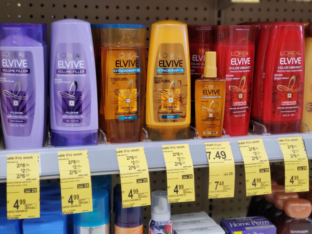 shelf full of L'oreal elvive shampoo with sale tags at walgreens