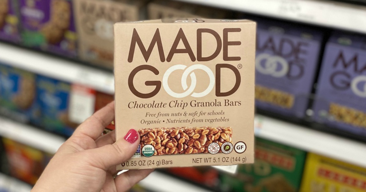 hand holding box of MadeGood Chocolate Chip Granola Bars 