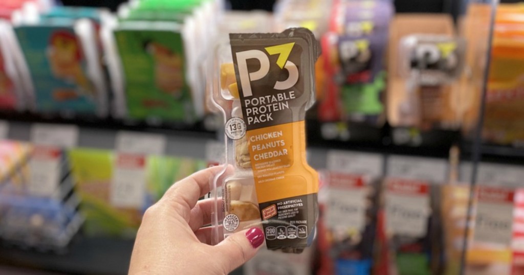 hand holding a P3 Protein PAck by cooler at Target