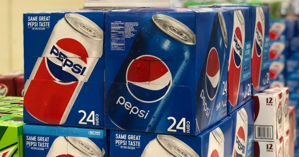 Large multipacks of cans of Pepsi on display in-store