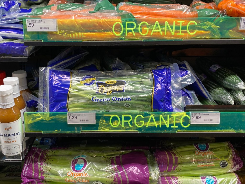 organic green onions on produce shelf in store