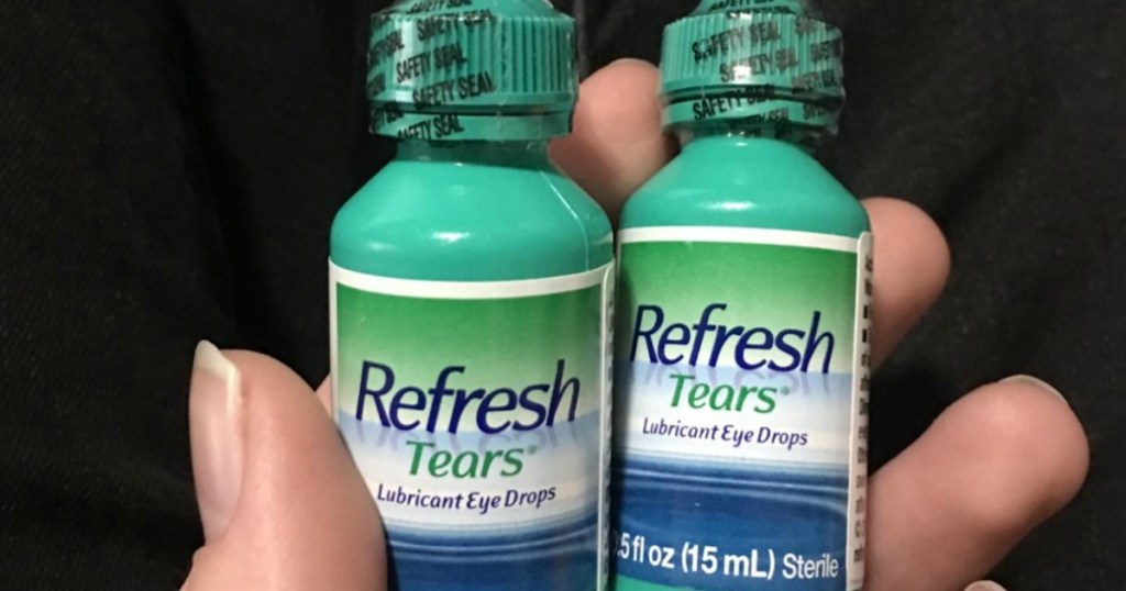 woman holding two bottles of Refresh Tears