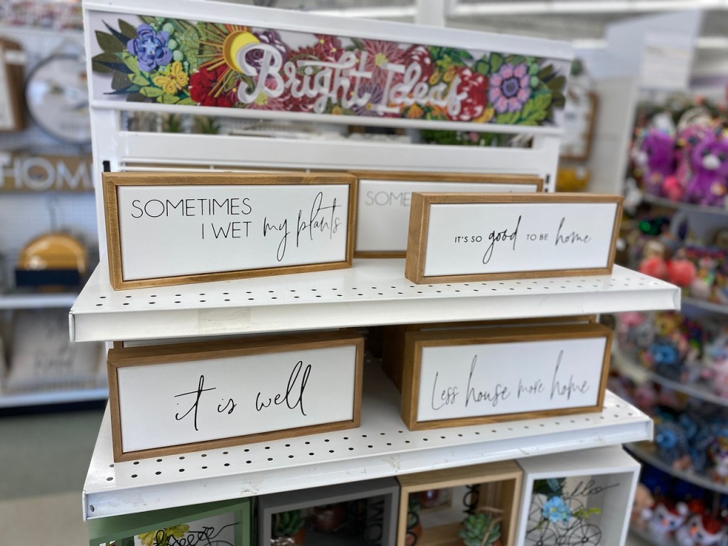 Place & Time Shelf Signs or Wall Decor Prints at Joann's on shelf