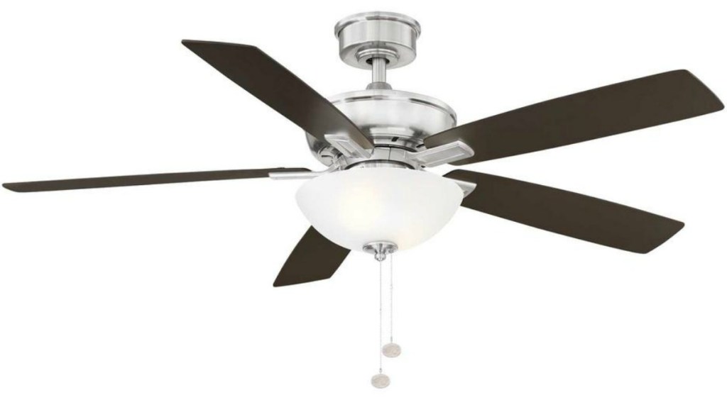 A brushed nickel ceiling fan with six blades and a light