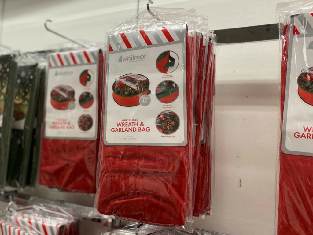 Packages of wreath storage bags hanging up in-store