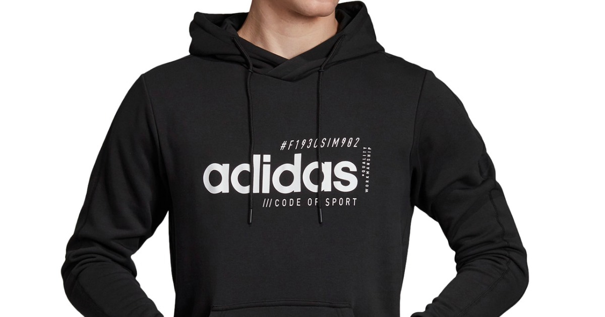 man wearing an adidas hoodie