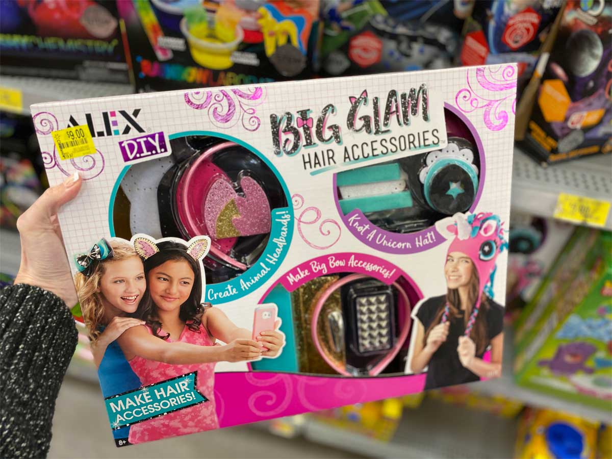 lady holding up alex diy big glam hair accessoreis kit