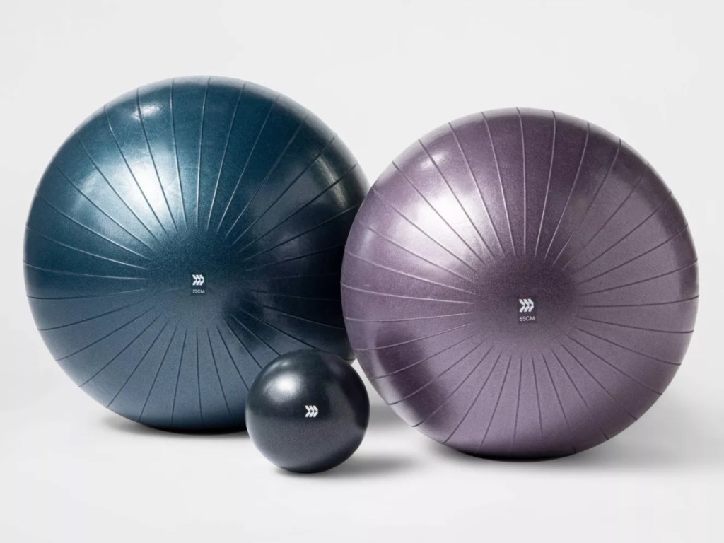 2 large exercise balls and 1 medicine ball
