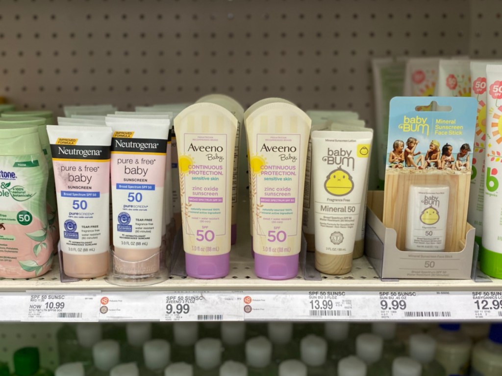 aveeno baby sunscreen and other baby products on store shelf