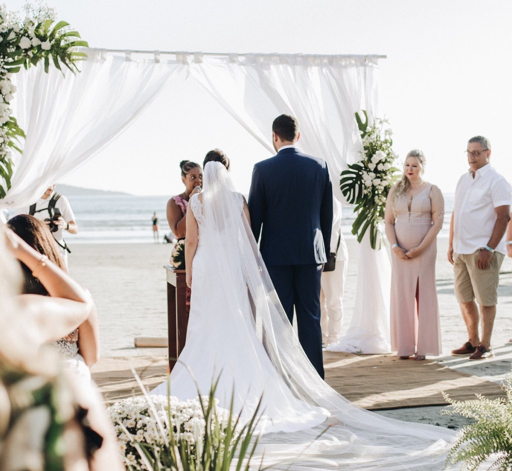 couple getting married at the beach