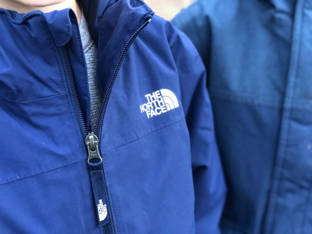 kids wearing blue the north face jackets