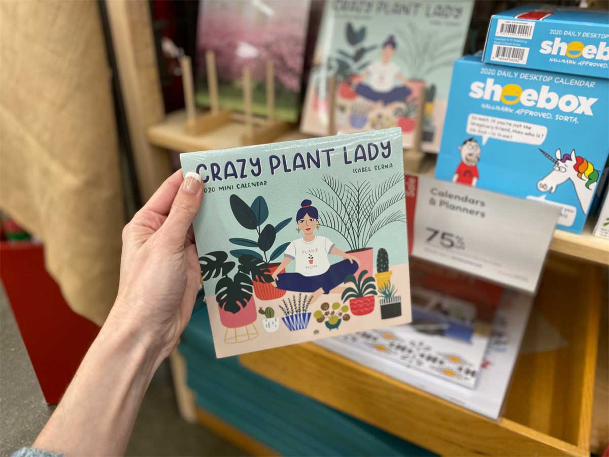 woman hand holding Mini Crazy Plant Lady 2020 Wall Calendar