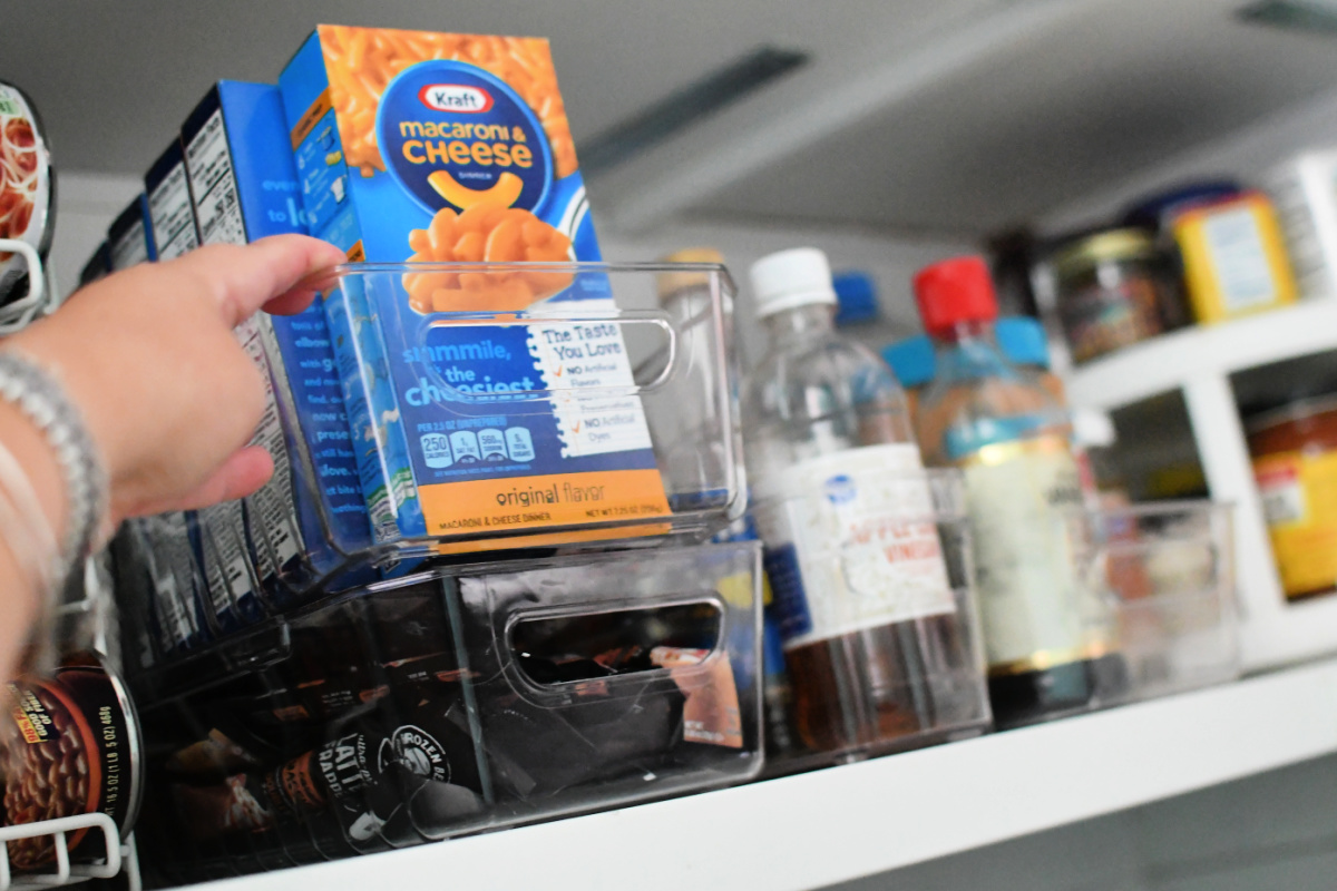 clear acrylic pantry organizers that allow you to see the food