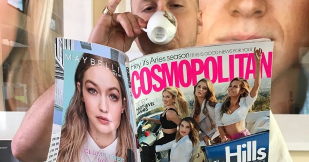 man reading cosmopolitan magazine with The Hills girls on the cover