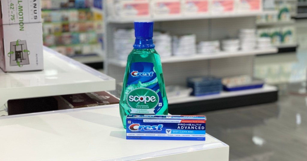 crest mouthwash and toothposte on store shelf