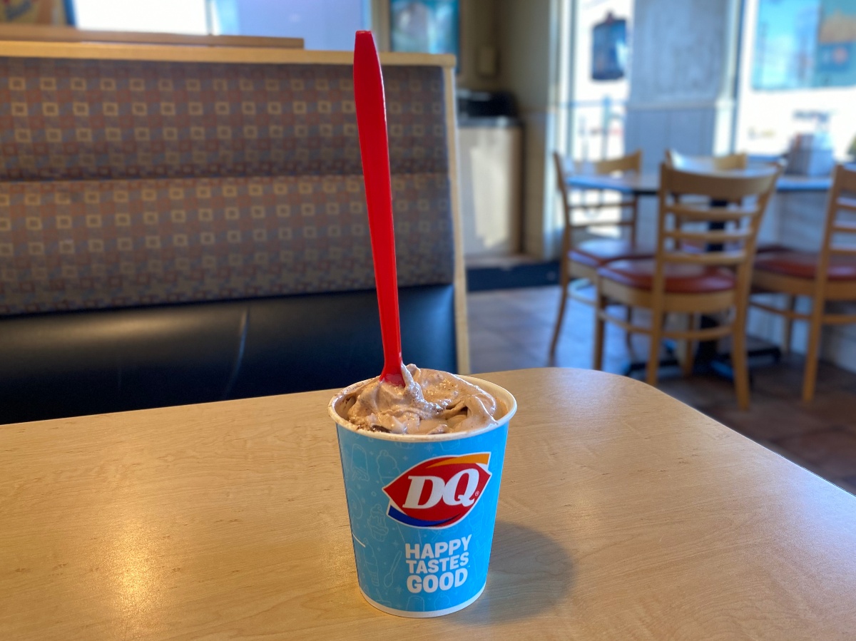 Dairy Queen blizzard with red spoon on table